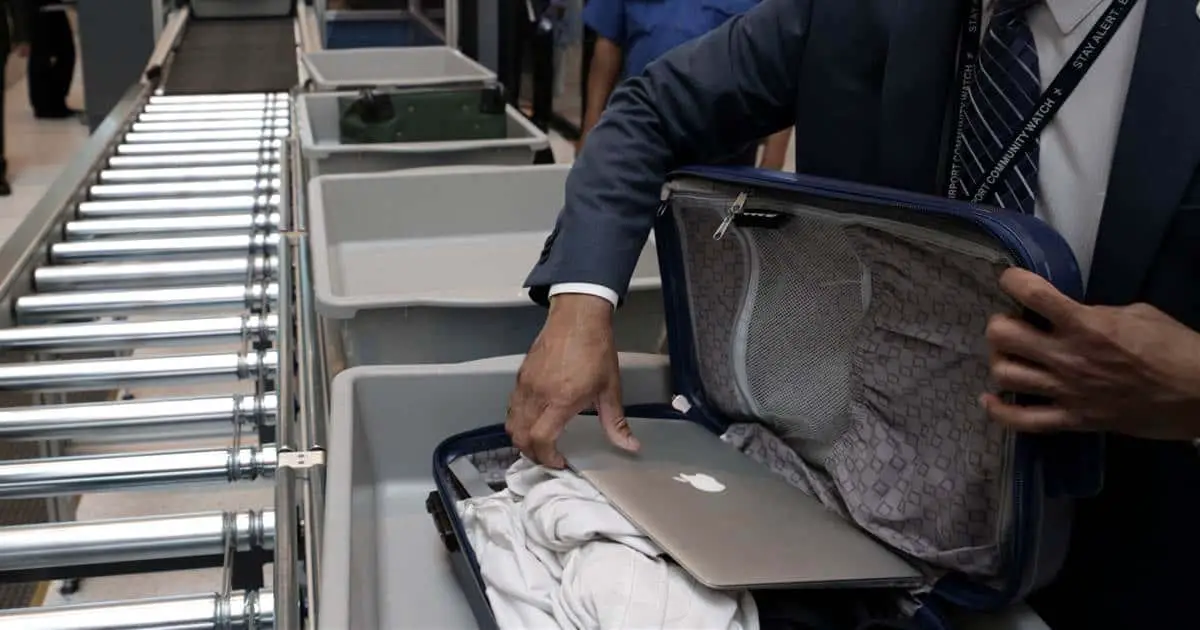 can you pack a laptop in checked luggage